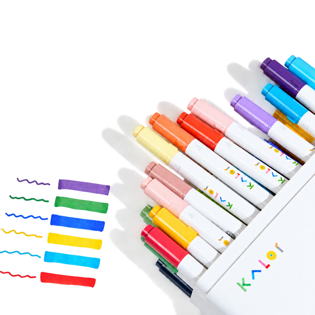 KALOR dual tip markers fanned out of their box beside hand-drawn colour swatches
